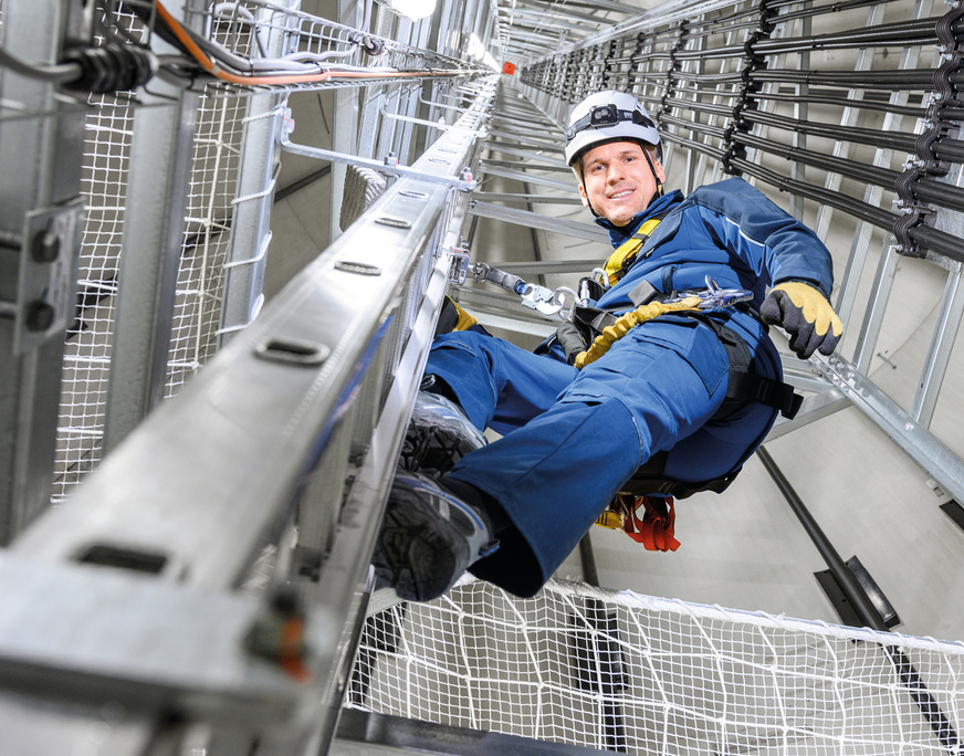 Stephan Mayer, Tüv Süd, im Windradaufstieg: mehr Höhe dank neuer Turmbaukonzepte