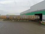 EEW-SPC-Rolls-Out-Worlds-Heaviest-Monopile2 | ... als großer Lindwurm wegrollen zum Lackieren. - © Foto: EEW SPC/Andreas Duerst, Studio 301 EEW-SPC-Rolls-Out-Worlds-Heaviest-Monopile2 | ... als großer Lindwurm wegrollen zum Lackieren. - © Foto: EEW SPC/Andreas Duerst, Studio 301