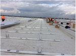 Montage Logistikhalle ohne Module | Noch vor wenige Tagen stand nur das Montagegestell. Jetzt sind die Monteure fast mit dem zweiten Modulfeld fertig. - © Max Solar Montage Logistikhalle ohne Module | Noch vor wenige Tagen stand nur das Montagegestell. Jetzt sind die Monteure fast mit dem zweiten Modulfeld fertig.