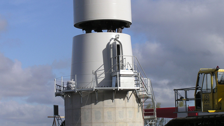 Ein Windpark wird gebaut. Solche Pläne stoßen oft auf Widerstand in der Nachbarschaft.