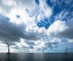 Vattenfall | Ormonde offshore wind farm: crew transfer vessel with Cumbrian landscape in background.