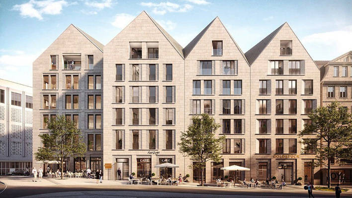 So wird das Gebäudeensemble einmal aussehen. Die solaren Dachziegel sind von den herkömmlichen Dachziegeln optisch nicht zu unterscheiden.