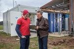 Fraunhofer Biogas | Jochim Gorre (left) from SolarFuel company, manager of the power-to-gas plant in the Hessian biogas research center, conversing with Frank Schünemeyer from Fraunhofer IWES. With the help of the plant, the direct methanation of biogas could be tested.